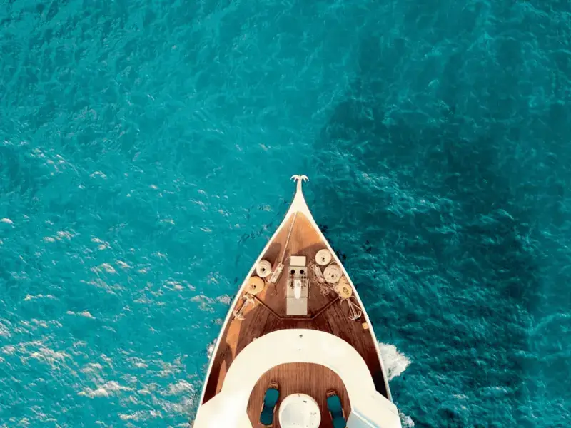 Yacht sailing over turquoise waters in Greece